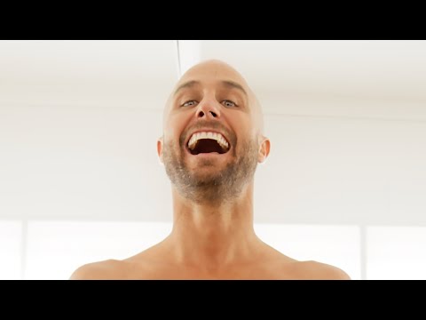 Scene from ‘Feeling J’Bay’ film premiere at the Corona Cero Open, showcasing surfers and spectators celebrating surf culture at Jeffreys Bay.